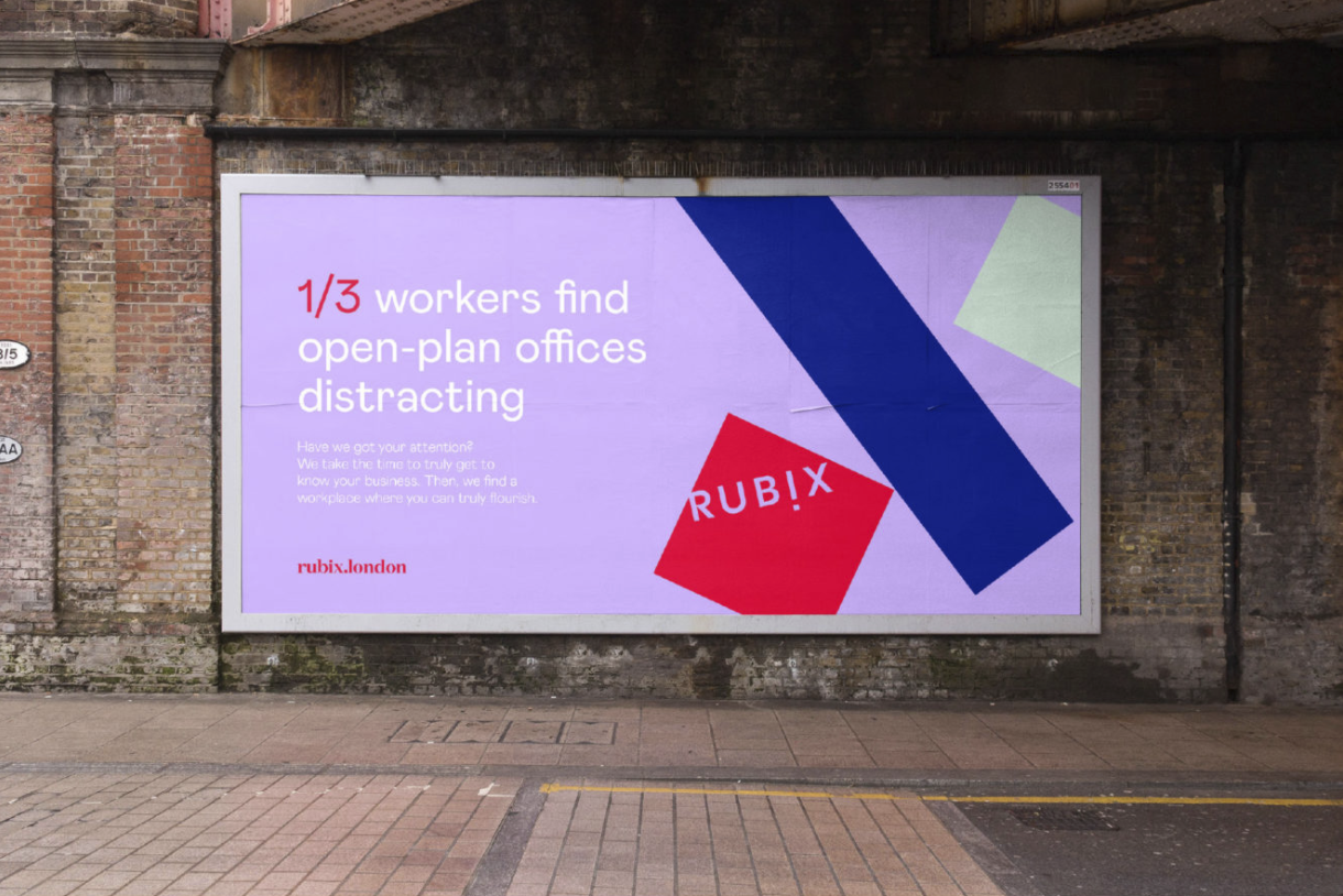 outdoor billboard with purple background and coloured blocks 